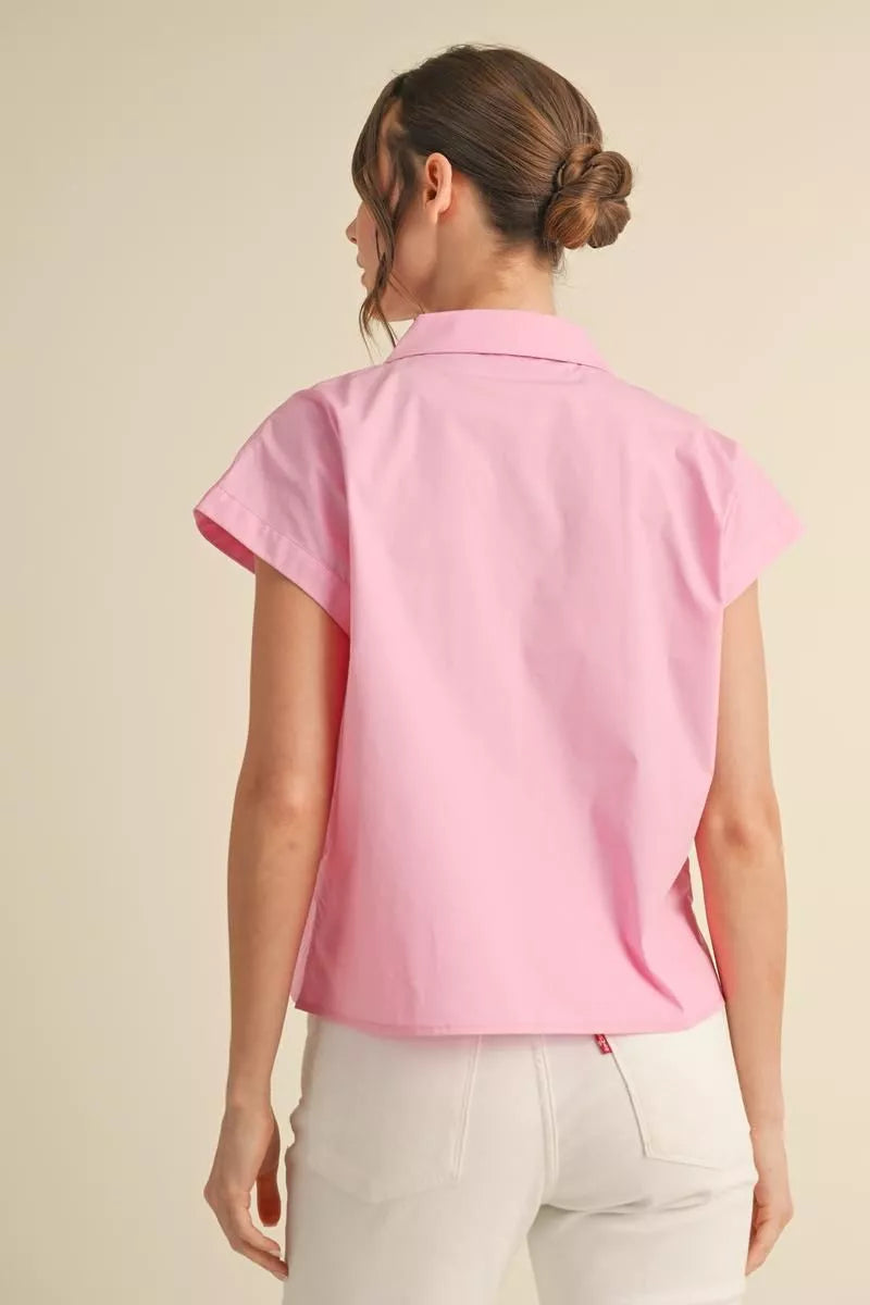 Flower embroidered top with collard neck, front buttoned closure, and short kimono sleeves.